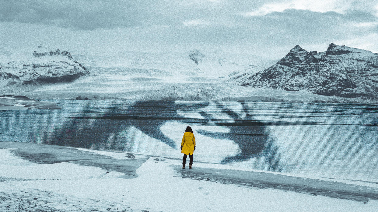  Photo collage of a lone woman facing a polar landscape. There is a frozen lake in front of her, with an overlaid large-scale photo of a woman's hands pressed against a pane of glass, as if trapped under the ice in distress. The woman's small silhouette is framed between the large hands. 