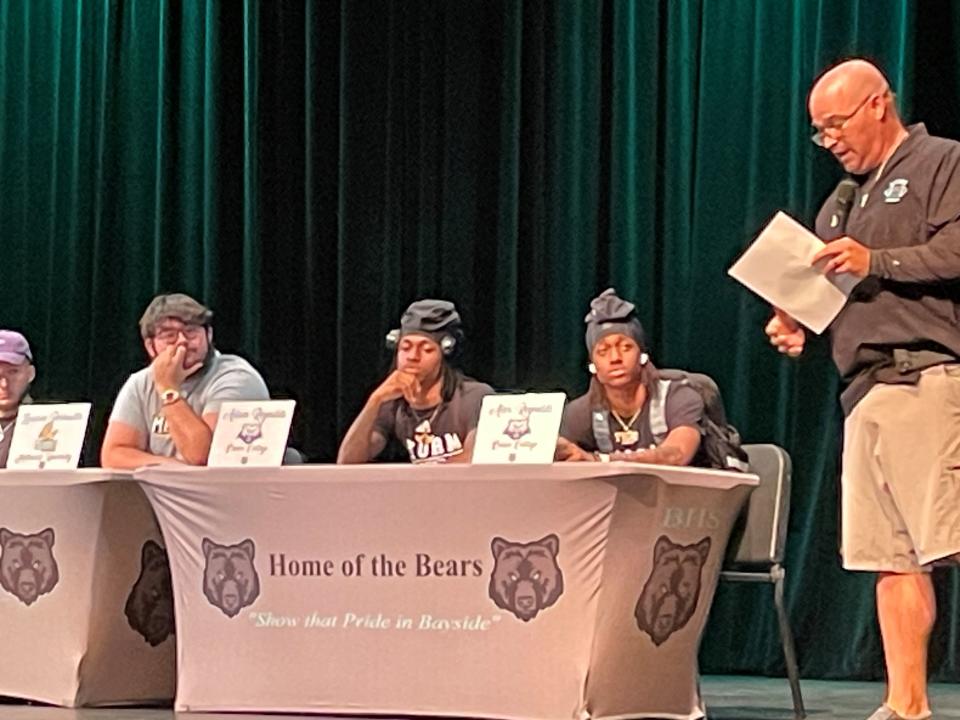 Bears coach Billy Miller talks about his three players who signed at Bayside High on Friday, April 5, 2024.
