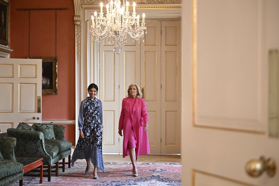 Akshata Murty, wife of Britain's Prime Minster, left, and US First Lady Jill Biden arrive for a meeting inside 10 Downing Street in central London, Friday, May 5, 2023. (Oli Scarff/Pool Photo via AP)