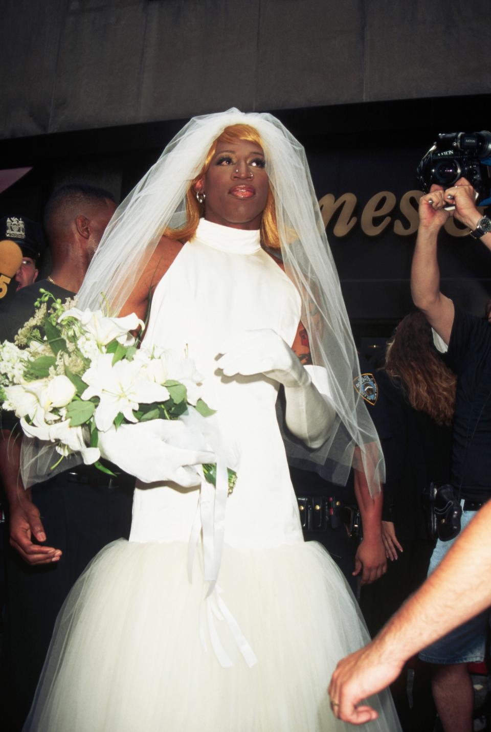 <h1 class="title">Dennis Rodman Dressed as a Bride</h1><cite class="credit">Photo: Getty Images/Mitchell Gerber</cite>