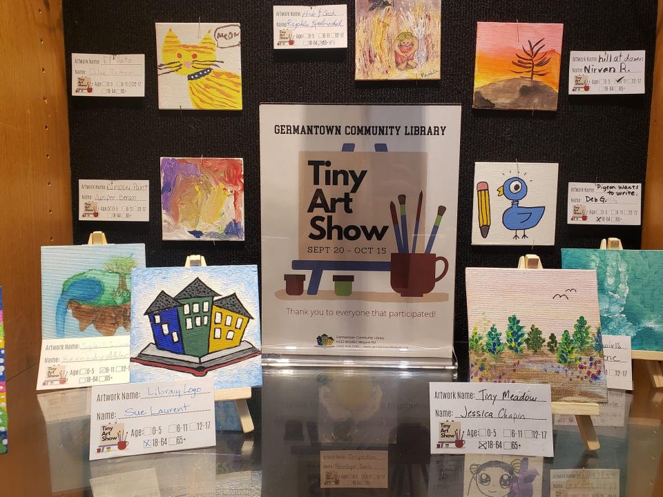 150 people of all ages contributed to the library's "Tiny Art Show" display case.