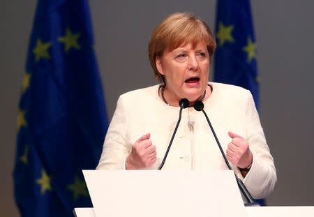 German Chancellor Angela Merkel speaks during Manfred Weber's, candidate of the European People's Party (EPP) for the next European Commission President, final campaign event ahead of the EU election in Munich, Germany, May 24, 2019. REUTERS/Michael Dalder