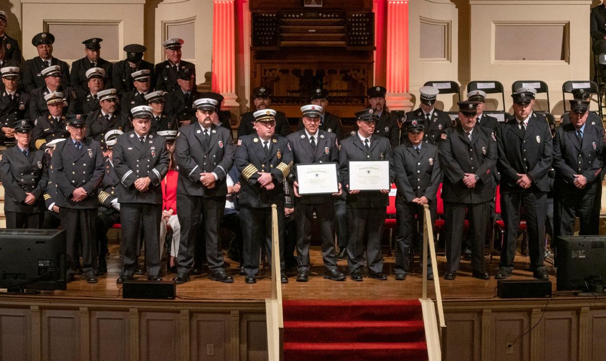 Members of the Berlin and Bolton fire departments received the Citation for Meritorious Conduct during Friday's 33rd annual Firefighter of the Year awards at Mechanics Hall in Worcester.