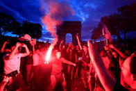 <p>France fans react on the Champs-Elysees after defeating Belgium in their World Cup semi-final match. REUTERS/Gonzalo Fuentes </p>