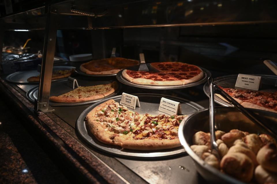 Pizza slices at Italian Village Pizza in the Lansing Mall, pictured Thursday, Feb. 1, 2024.