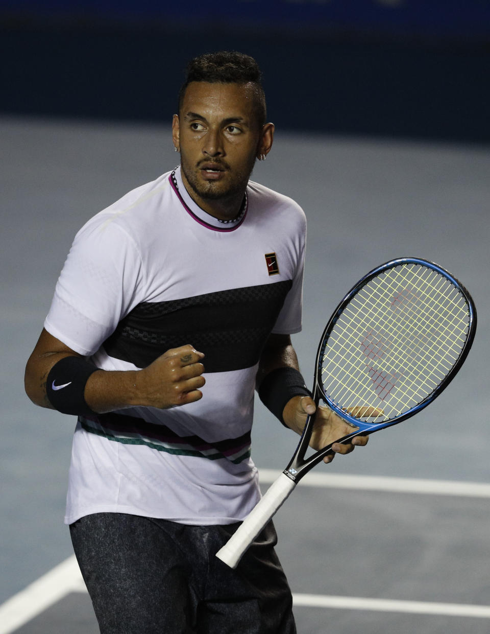 Australia's Nick Kyrgios celebrates a point in his Mexican Tennis Open final match against Germany's Alexander Zverev, in Acapulco, Mexico, Saturday, March 2, 2019. (AP Photo/Rebecca Blackwell)