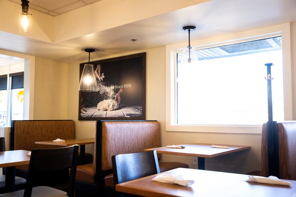 Table settings are seen inside the remodeled Perkins Restaurant & Bakery on Wednesday at 819 1st Ave. in Coralville. The restaurant was closed for 15 months after a fire that caused more than $500,000 in damages. It reopens Monday.