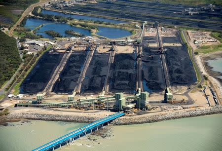 Coal sits at the Hay Point and Dalrymple Bay Coal Terminals that receive coal along the Goonyella rail system, that services coal mines in the Bowen Basin, located south of the Queensland town of Mackay in Australia, April 11, 2017. REUTERS/Daryl Wright