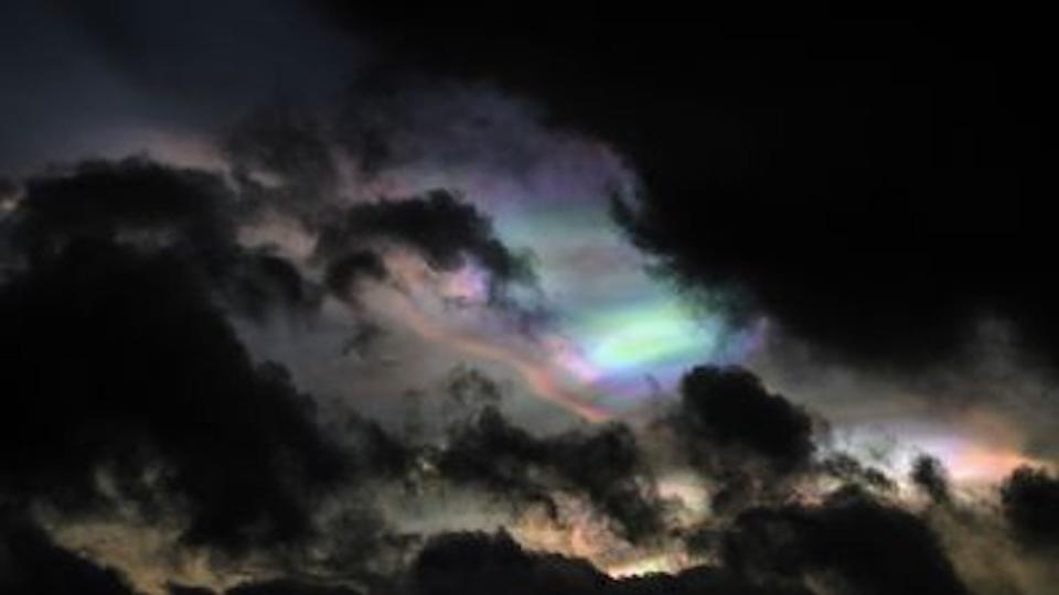 PSCs shine through a gap in the clouds above Kvaløya in Norway on Jan. 25.