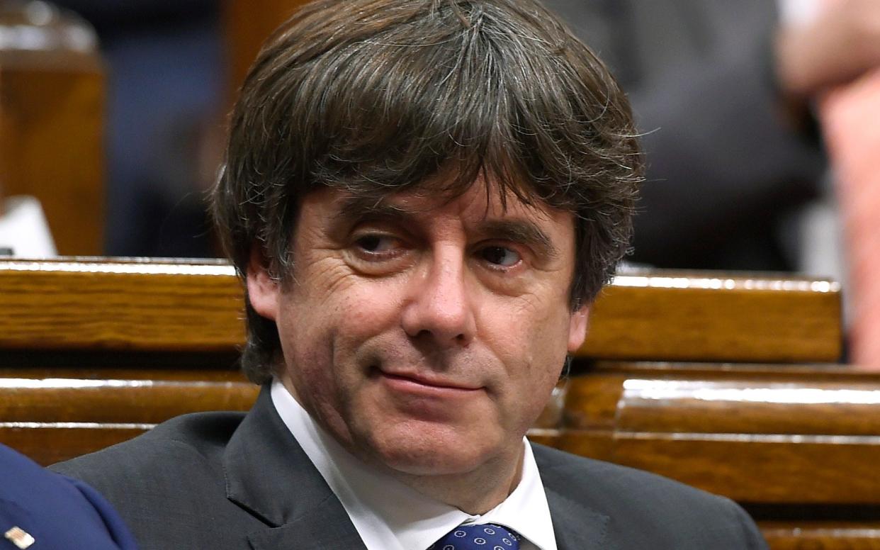Catalan president Carles Puigdemont fled Spain after the regional parliament made an unsuccessful declaration of independence - AFP
