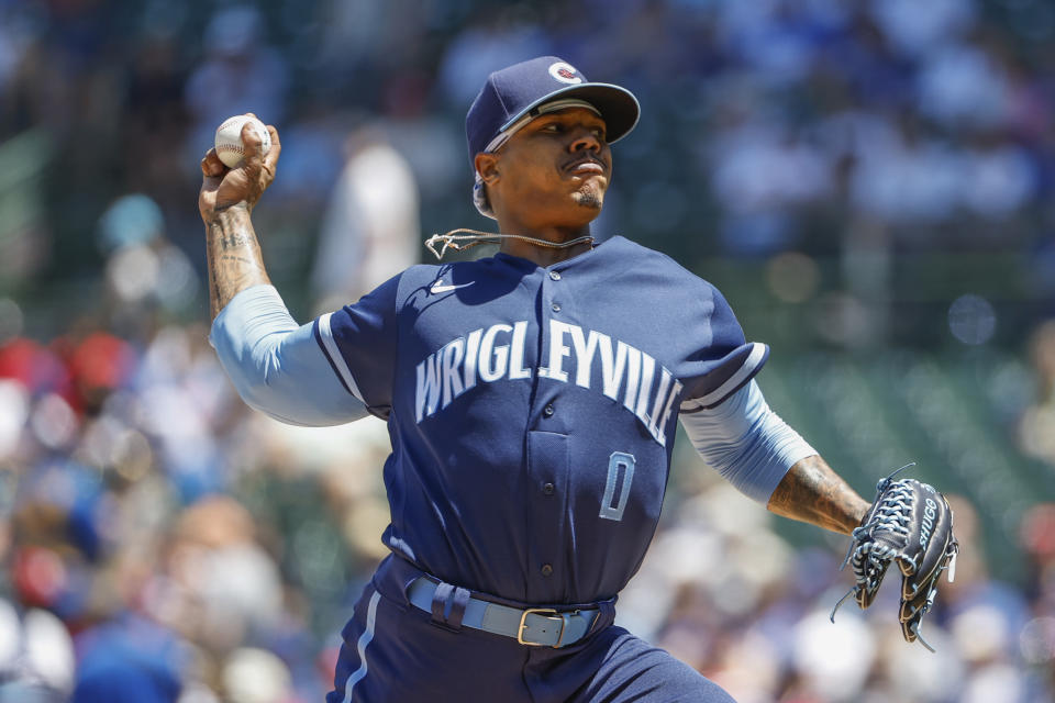 Chicago Cubs starting pitcher Marcus Stroman delivers against the St. Louis Cardinals during the first inning of a baseball game, Friday, June 3, 2022, in Chicago. (AP Photo/Kamil Krzaczynski)