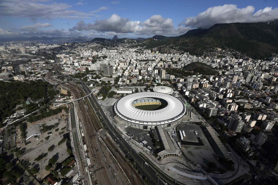 An aerial shot shows the Maracana stadium, one of the stadiums hosting the 2014 World Cup soccer matches, in Rio de Janeiro March 28, 2014. REUTERS/Ricardo Moraes (BRAZIL - Tags: SPORT SOCCER WORLD CUP CITYSCAPE)