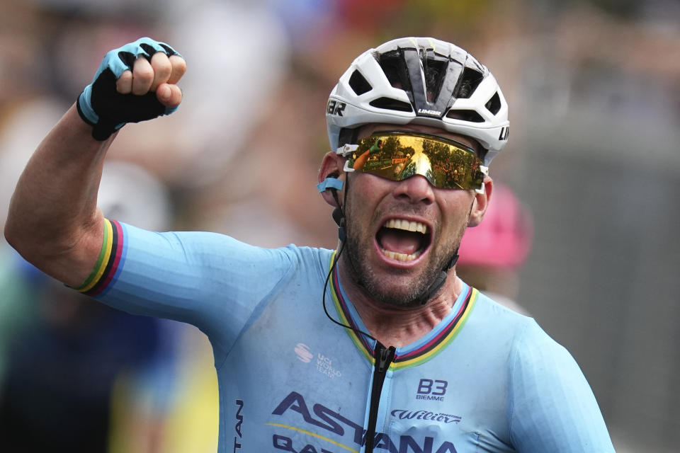 Britain's sprinter Mark Cavendish crosses the finish line to win a record 35th Tour de France stage and break the record of Belgian legend Eddy Merckx in the fifth stage of the Tour de France cycling race over 177.4 kilometers (110.2 miles) with start in Saint-Jean-de-Maurienne and finish in Saint-Vulbas, France, Wednesday, July 3, 2024. (AP Photo/Daniel Cole)