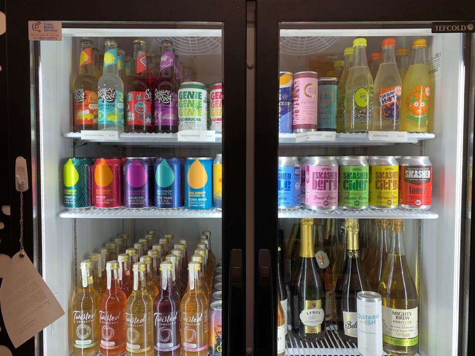 The shop has a fridge stocked with alcohol-free drinks.