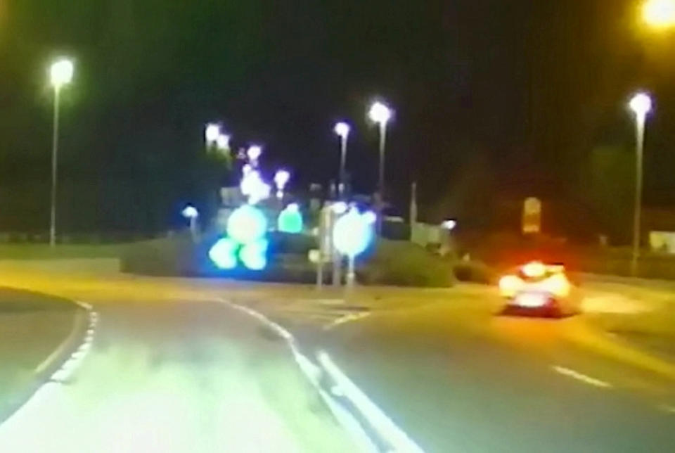 A dangerous driver was brought to a halt after taking cops on a high-speed chase through five villages.  See SWNS story SWMRspeed.  Ondrej Kralik, 30, reached speeds of 95mph during the pursuit, which lasted for ten minutes and ended when he became wedged between a BMW and a sign post, enabling officers to pull him out of the car and arrest him.  The pursuit began when officers spotted him mount a grass verge as he recklessly overtook another vehicle on a roundabout along Old Rufford Road, Calverton.  He then accelerated away at speed, prompting the officers to turn around in order to catch up with the silver Kia Ceed.  Upon nearing the Kia and activating blue lights and sirens, Kralik increased his speed and failed to stop. 