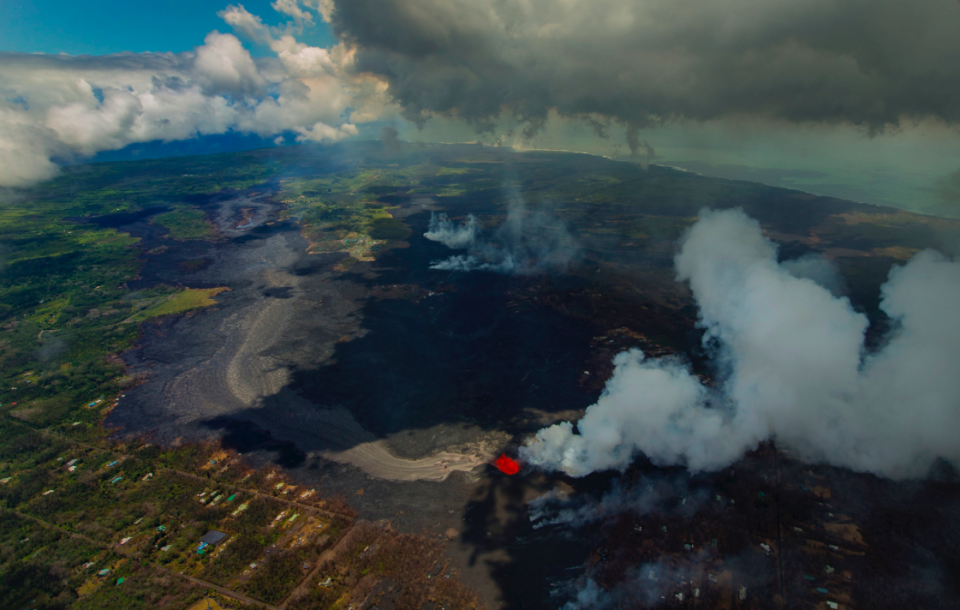 <em>New land has been created as a result of the volcano (PA)</em>