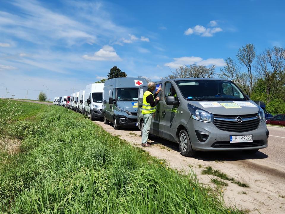 U.S. nonprofit Common Man for Ukraine co-founder Alex Ray inspects a van that was part of a convoy sending food and other supplies from Poland to Ukraine in May 2023. Ray, who owns a chain of popular New Hampshire family-owned restaurants ironically called Common Man, has donated more than $1 million in aid to Ukrainian children who lost a loved one during Russia's war in Ukraine.