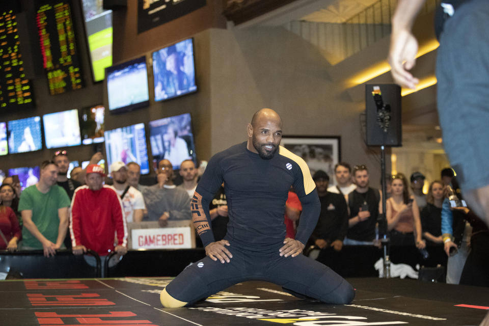 Middleweight fighter Yoel Romero, of Cuba, stretches during open workouts for UFC 248, in Las Vegas on Wednesday, March 4, 2020. (Steve Marcus/Las Vegas Sun via AP)