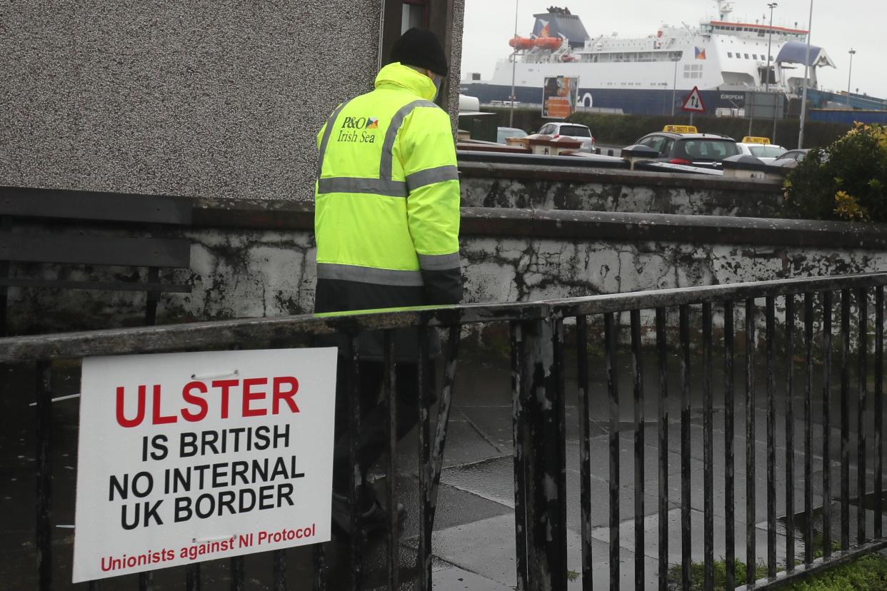 <p>An anti-Brexit sign near the entrance to Larne port</p> (PA)