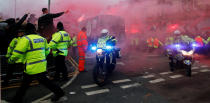 <p>Soccer Football – Champions League Quarter Final First Leg – Liverpool vs Manchester City – Anfield, Liverpool, Britain – April 4, 2018 Liverpool fans set off flares and throw missiles at the Manchester City team bus outside the stadium before the match Action Images via Reuters/Carl Recine </p>