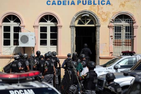 Riot police enter at the public jail in Manaus where some prisoners were relocated after a deadly prison riot in Manaus, Brazil, January 6, 2017. REUTERS/Michael Dantas