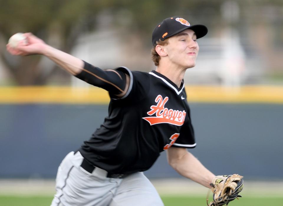 Hoover's Zach Braucher delivers a pitch at Louisville during a high school baseball game on Friday, April 14, 2023.