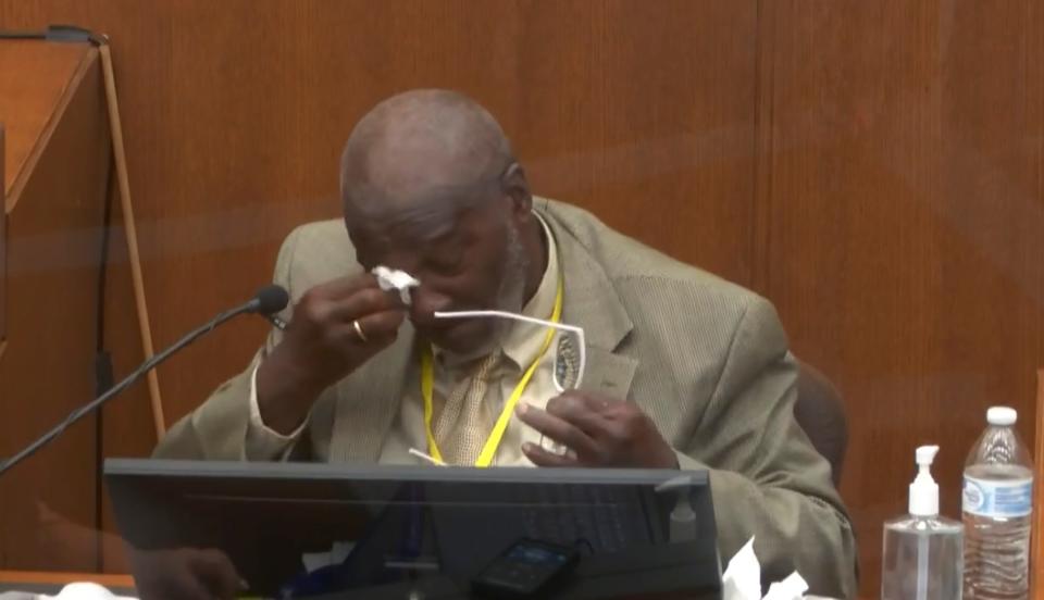 Witness Charles McMillian becomes emotional as he answers questions March 31 in the trial of former Minneapolis police officer Derek Chauvin at the Hennepin County Courthouse in Minneapolis.