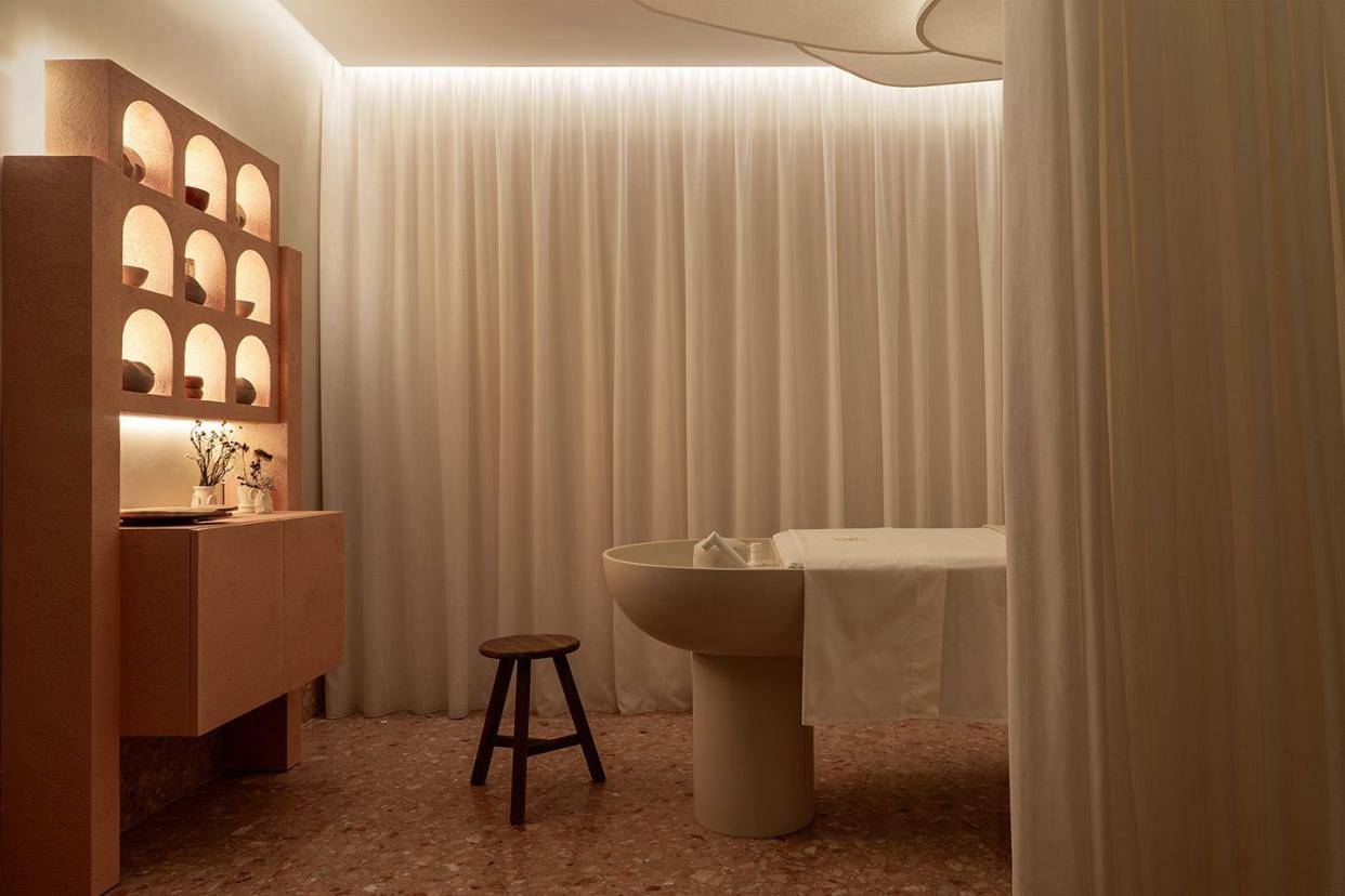 a bathroom with a white curtain