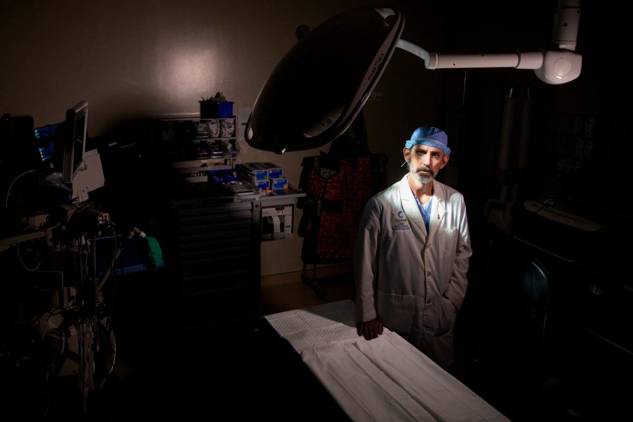 Dr. Derek Kelly, an orthopedic surgeon at Le Bonheur Children’s Hospital and Campbell Clinic, poses for a portrait in an operating room at the hospital in Memphis, Tenn., on Wednesday, November 29, 2023. As of Dec. 6, Le Bonheur had treated a record 165 gunshot victims in 2023 – and these numbers don’t include the youth who are treated elsewhere or pronounced dead on the scene.