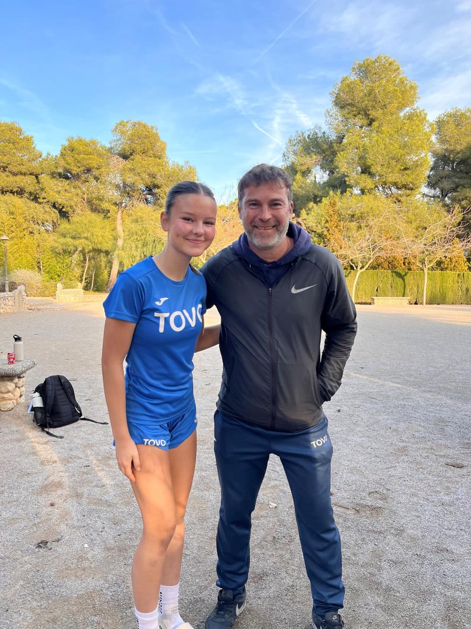Leah Schamberg poses with Oscar Jorquera, one of her soccer coaches at the TOVO Academy in Spain.
