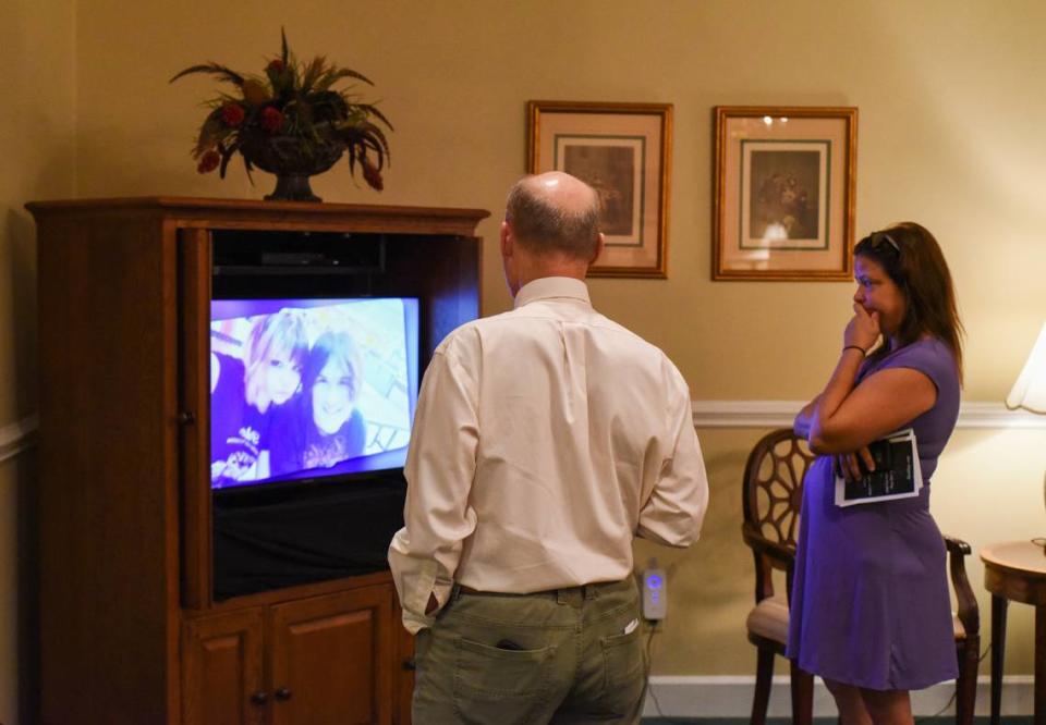 A photo of Laird Ramirez and his girlfriend shows on a screen at his Celebration of Life in Huntersville, N.C. Saturday, July 15, 2023.