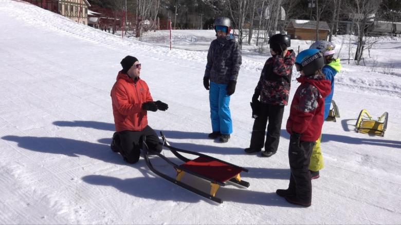 Kids from do-it-yourself backyard luge track get to try the real thing