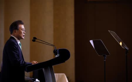 South Korea's President Moon Jae-in speaks at the ISEAS 42nd Singapore Lecture in Singapore July 13, 2018. REUTERS/Edgar Su