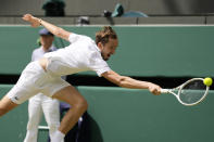 Russia's Daniil Medvedev in action against Czech Republic's Jiri Lehecka during their men's singles match on day eight of the Wimbledon tennis championships in London, Monday, July 10, 2023. (AP Photo/Kirsty Wigglesworth)