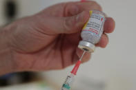 A nurse prepares a syringe with Moderna COVID-19 vaccine during the national launch of the vaccination of hospital staff at the Etterbeek-Ixelles site of the Iris Sud Hospitals in Brussel​s, Monday, Jan. 18, 2021. (Stephanie Lecocq, Pool Photo via AP)