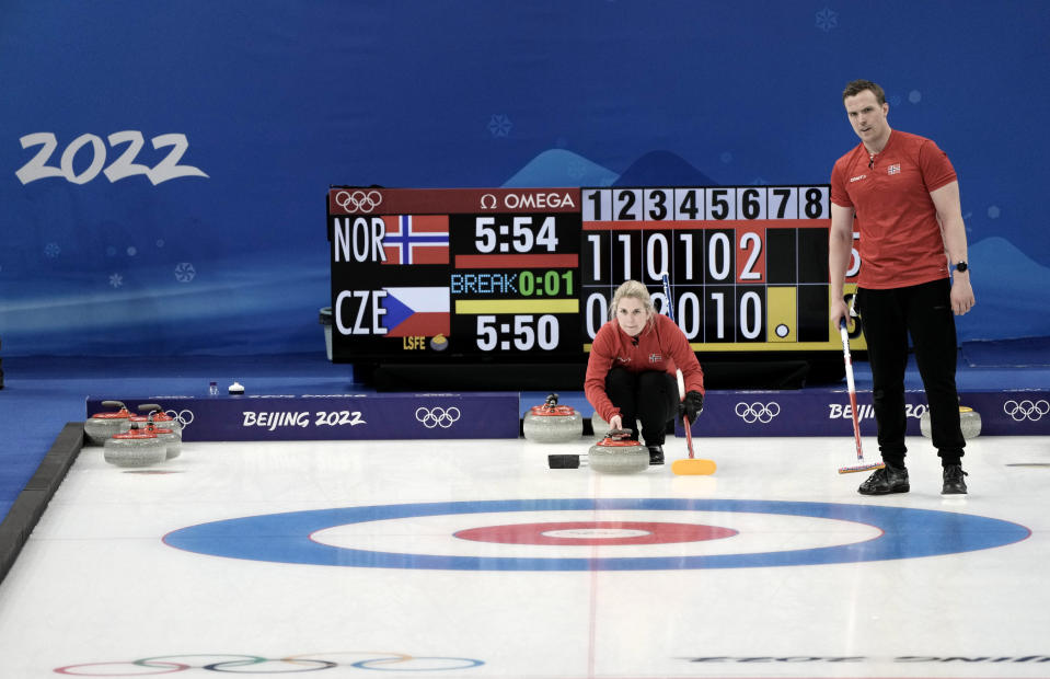 Norway's Kristin Skaslien, throws a stone during their mixed doubles curling match against Czech Republic, at the 2022 Winter Olympics, Wednesday, Feb. 2, 2022, in Beijing. (AP Photo/Nariman El-Mofty)