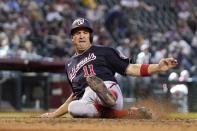 Washington Nationals' Ryan Zimmerman scores a run during the eighth inning of a baseball game against the Arizona Diamondbacks,Sunday, May 16, 2021, in Phoenix. (AP Photo/Ross D. Franklin)