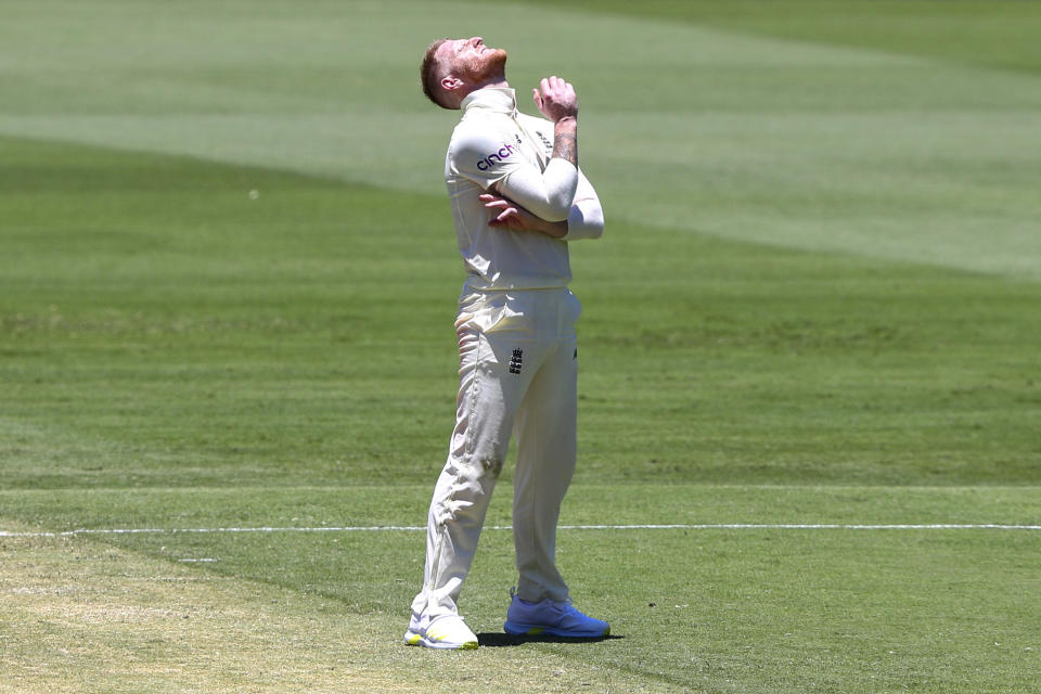 England's Ben Stokes reacts during day two of the first Ashes cricket test at the Gabba in Brisbane, Australia, Thursday, Dec. 9, 2021. (AP Photo/Tertius Pickard)