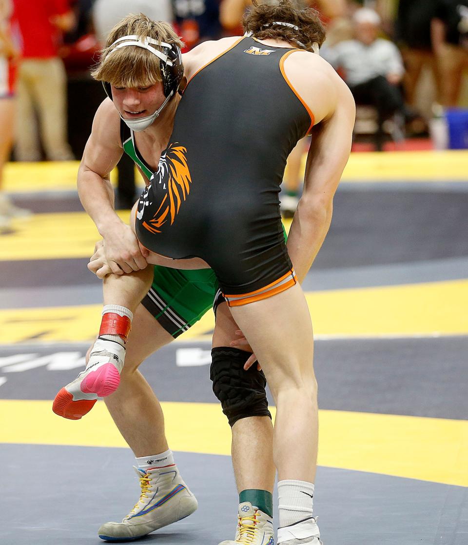 Clear Fork's Luke Schlosser wrestles Marlington's Phoenix Porter during their 165 lbs. match at the OHSAA State Wrestling Championships Friday, March 10, 2023 at the Jerome Schottenstein Center. TOM E. PUSKAR/ASHLAND TIMES-GAZETTE