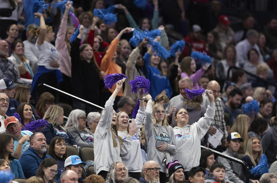 Fans cheer for the Omaha Supernovas as they play against the Atlanta Vibe during a Pro Volleyball Federation game Wednesday, Jan. 24, 2024, in Omaha, Neb. (AP Photo/Rebecca S. Gratz)