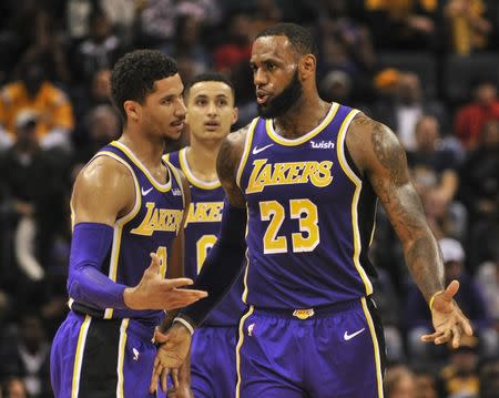 Dec 8, 2018; Memphis, TN, USA; Los Angeles Lakers guard Josh Hart (3) talks to Lakers forward LeBron James (23) during the second half against the Memphis Grizzlies at FedExForum. Justin Ford-USA TODAY Sports