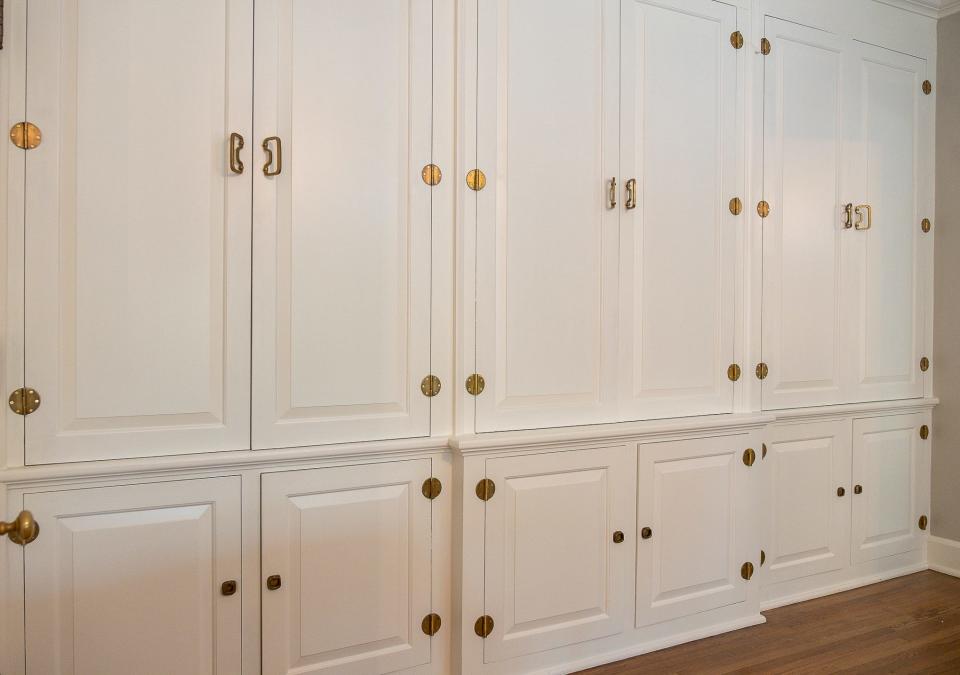 This wall of closets is in the primary bedroom. It was installed by a previous owner, but the Barretts made the closets deeper in order to add more storage space.