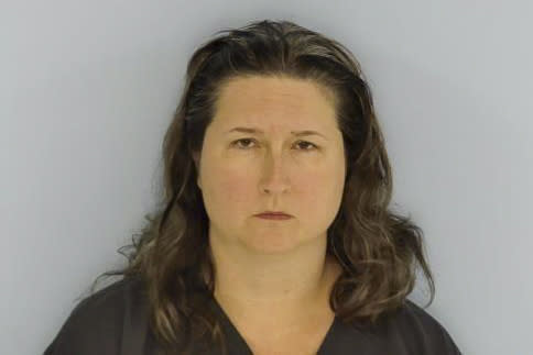 This undated mugshot provided by the Walton County Sheriff’s Office in Florida on Tuesday, May 2, 2023, shows Selena Chambers. Chambers, 41, of Tallahassee, is accused of throwing a glass of wine at Republican Rep. Matt Gaetz during an event in Miramar Beach and shouting obscenities at him, according to a Facebook post by the Walton County Sheriff’s Office. (Walton County Sheriff’s Office via AP)