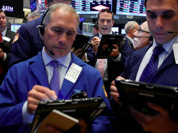 Traders work on the floor of the New York Stock Exchange (NYSE) in New York City, U.S., May 16, 2016.  REUTERS/Brendan McDermid