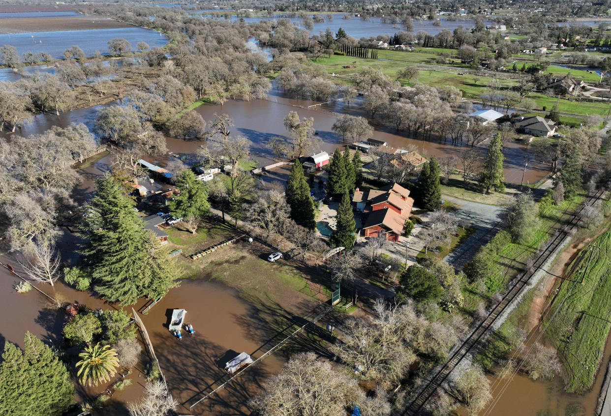 An aerial view of the damage after rainstorms caused a levee to break, flooding Sacramento County roads near Wilton, California, U.S., January 1, 2023.  REUTERS/Fred Greaves