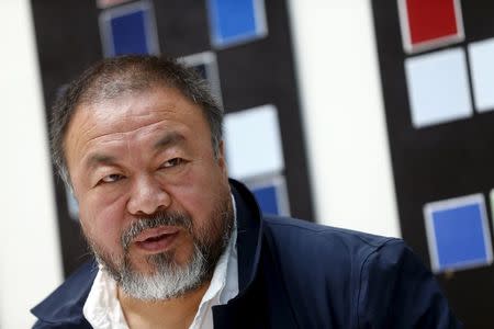 Chinese artist Ai Weiwei speaks to the media during a news conference ahead of an exhibition 'Chinese Whispers' at the Center Paul Klee in Bern, Switzerland April 27, 2016. REUTERS/Ruben Sprich