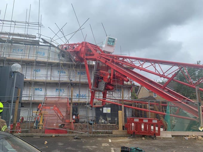 A crane has collapsed onto a house in east London: London Fire Brigade