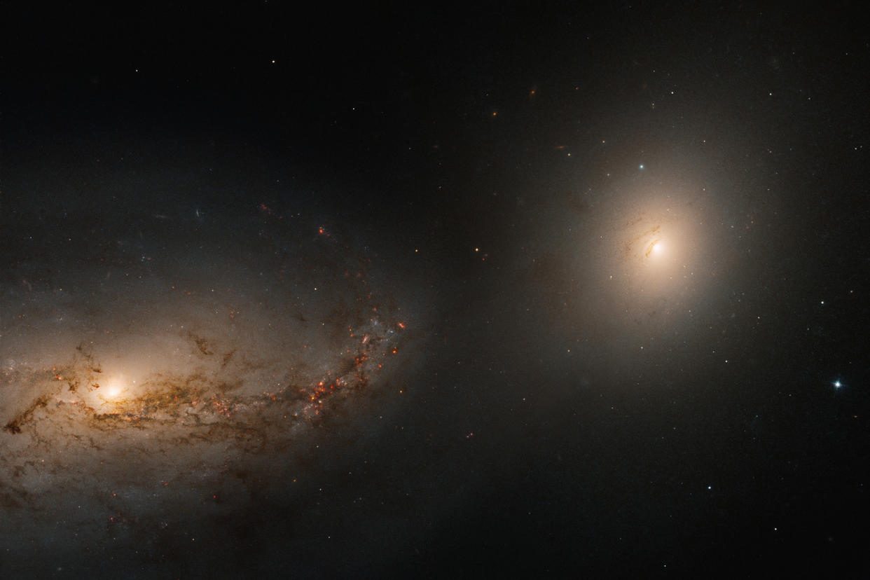 Nasa Releases Stunning Hubble Photo Of Two Galaxies Locked In A Dance 8988
