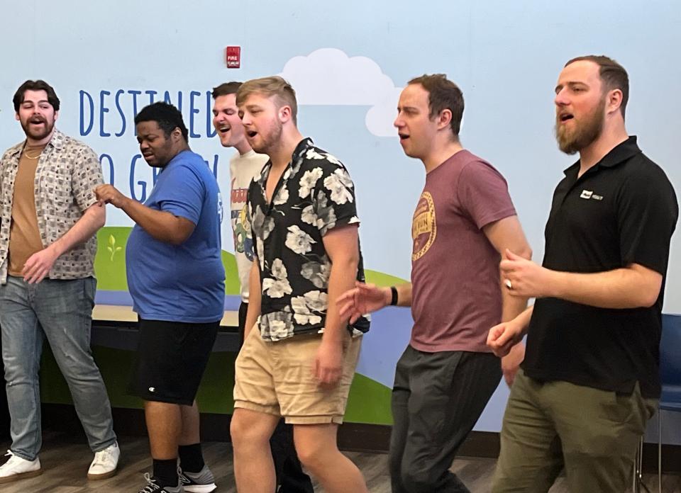 Members of Vox Audio rehearse last week in preparation for this weekend's performances of "We're Still Standing," which feature a cappella songs by Billie Eilish, Sam Smith, Charlie Puth, Elton John, Queen, Lady Gaga and Destiny's Child. Shows are Friday and Saturday at the Cultural Center for the Arts in downtown Canton.