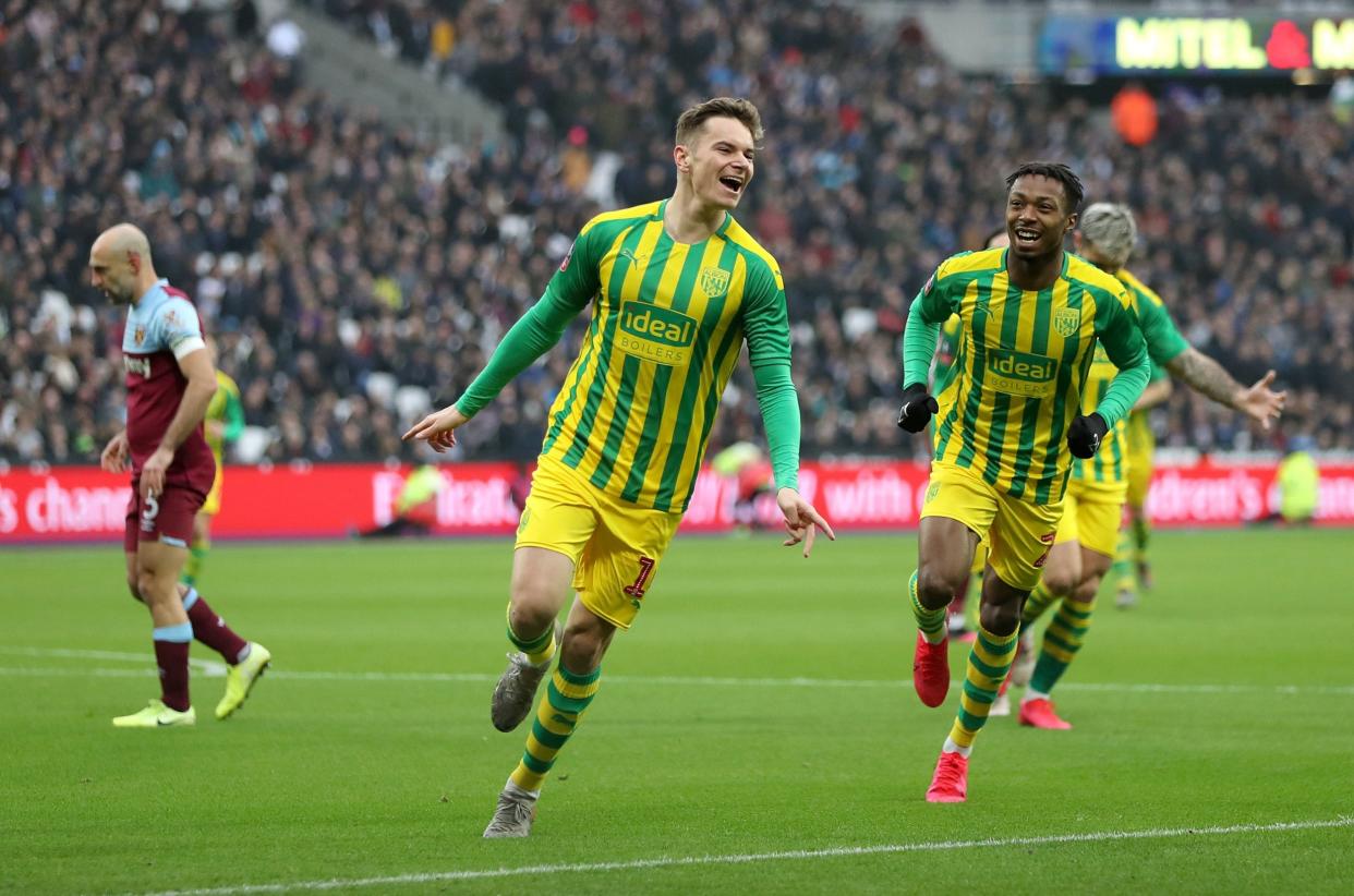 Conor Townsend celebrates putting West Brom in front at the London Stadium: PA